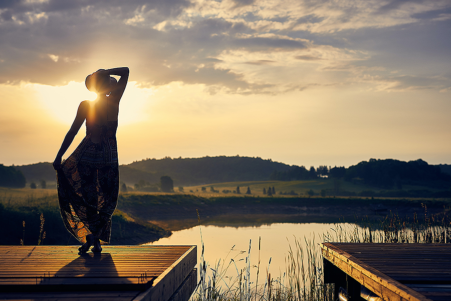 Woman watching the sunrise